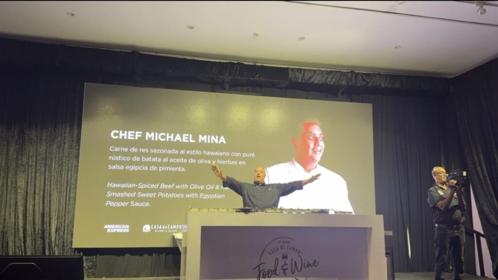 Chef Michael Mina presenting his Hawaiian-spiced beef dish during a live cooking demonstration