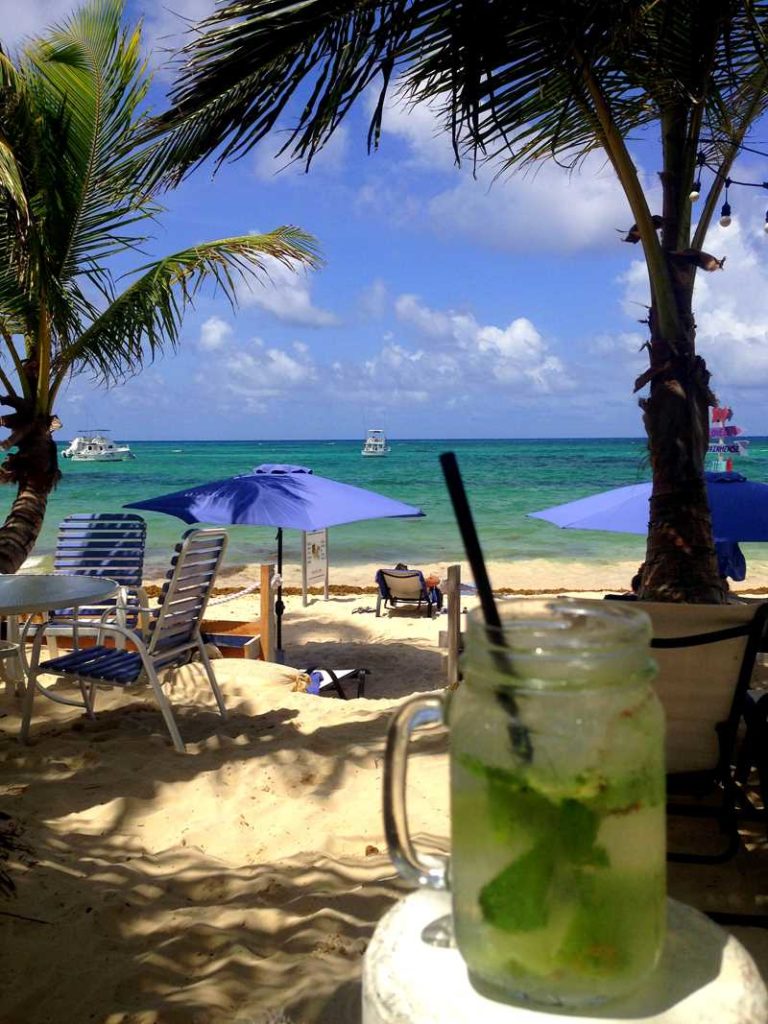 Having a cocktail at El Cortecito Beach in Bavaro, Punta Cana