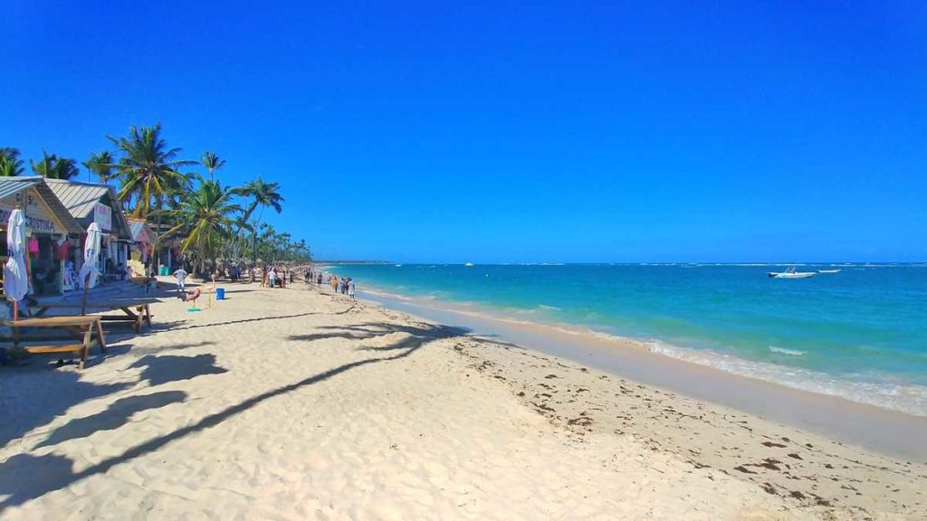 The beach of El Cortecito with numerous bars and shops