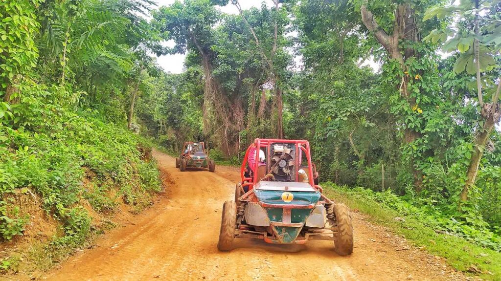 Dune buggy ride through tropical vegetation at La Hacienda Park Punta Cana