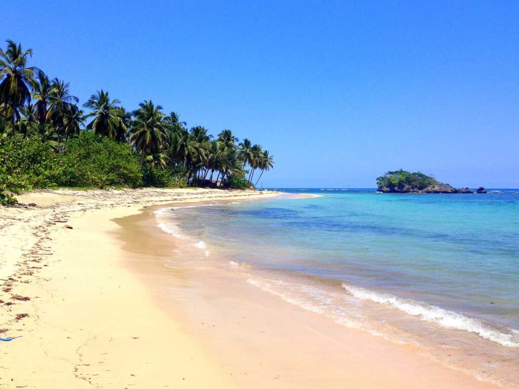 Playa Ermitano II, a remote and pristine beach on the Samaná peninsula, accessible by hike or boat only