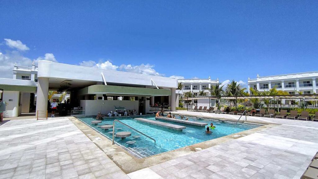View of Naiboa pool area within Riu Palace Bavaro resort