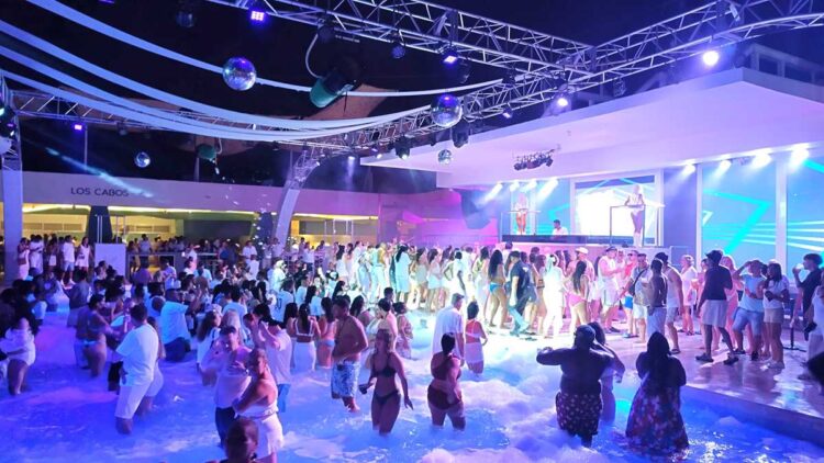 Night party scene with DJ at Riu Party