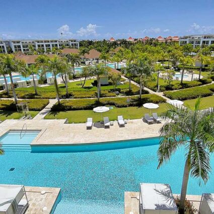 Balcony view over the stunning pools and lush tropical grounds at Paradisus Grand Cana, Punta Cana.
