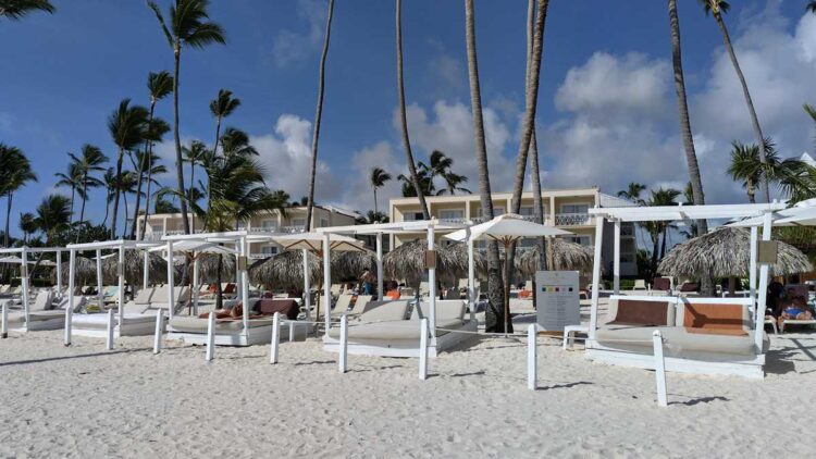 A view of the beach and resort area at Sunscape Coco Preferred Club, offering exclusive beachfront access