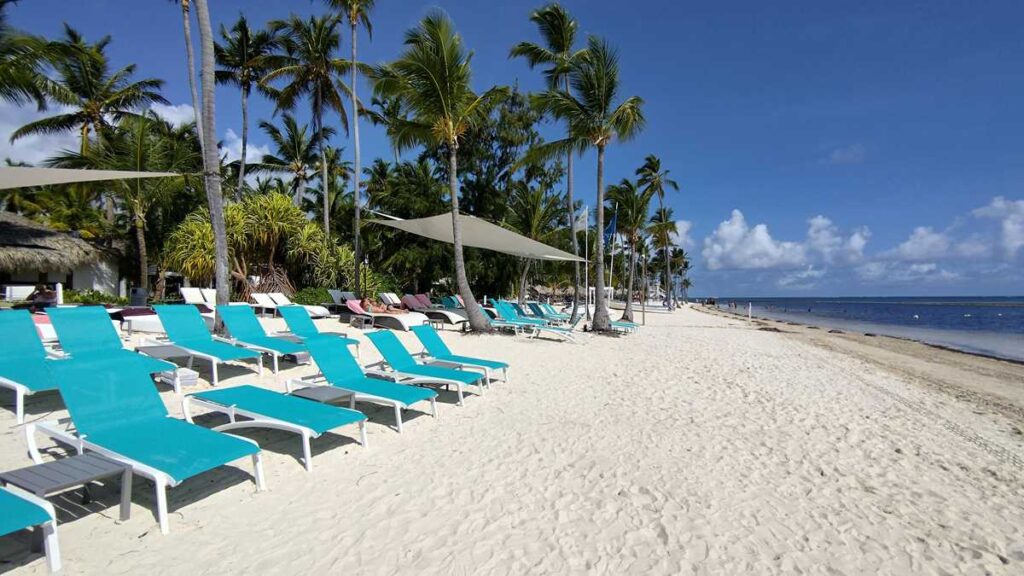 A pristine beach at Catalonia Punta Cana Resort with turquoise waters and white sand