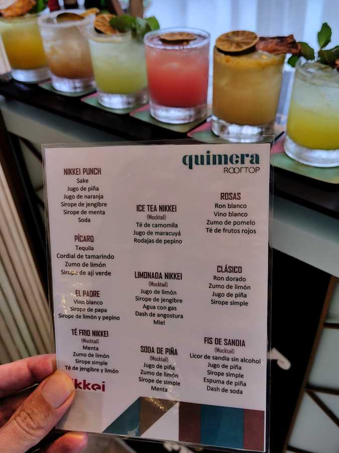A variety of cocktails displayed on the menu at Quimera Rooftop Bar at Melia Punta Cana Beach Resort