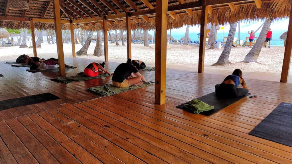 Morning yoga by the ocean at Meliá Punta Cana Beach Resort, a serene start to the day.