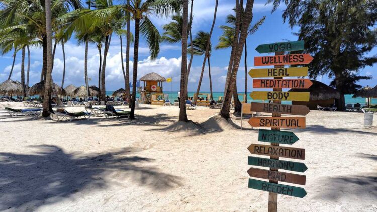 A wide beach under a bright blue sky at Melia Punta Cana Beach Resort