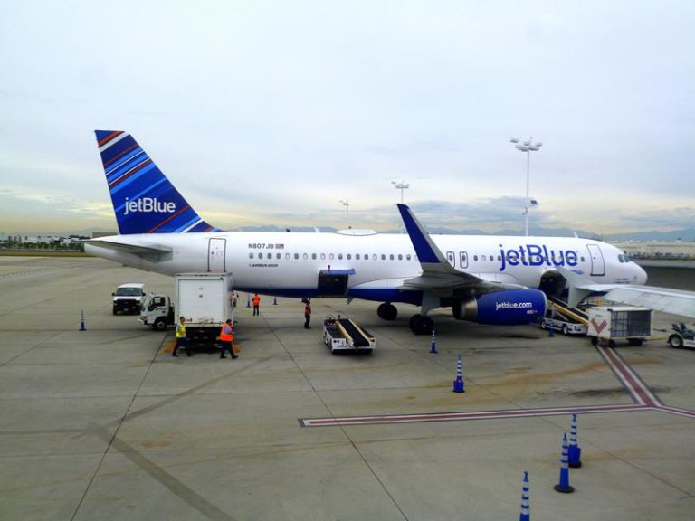 A JetBlue airplane at the airport